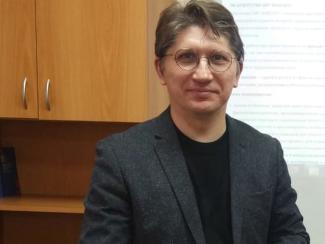 Доцент кафедры права и философии ИИГСО НГПУ Андрей Васильевич Харламов